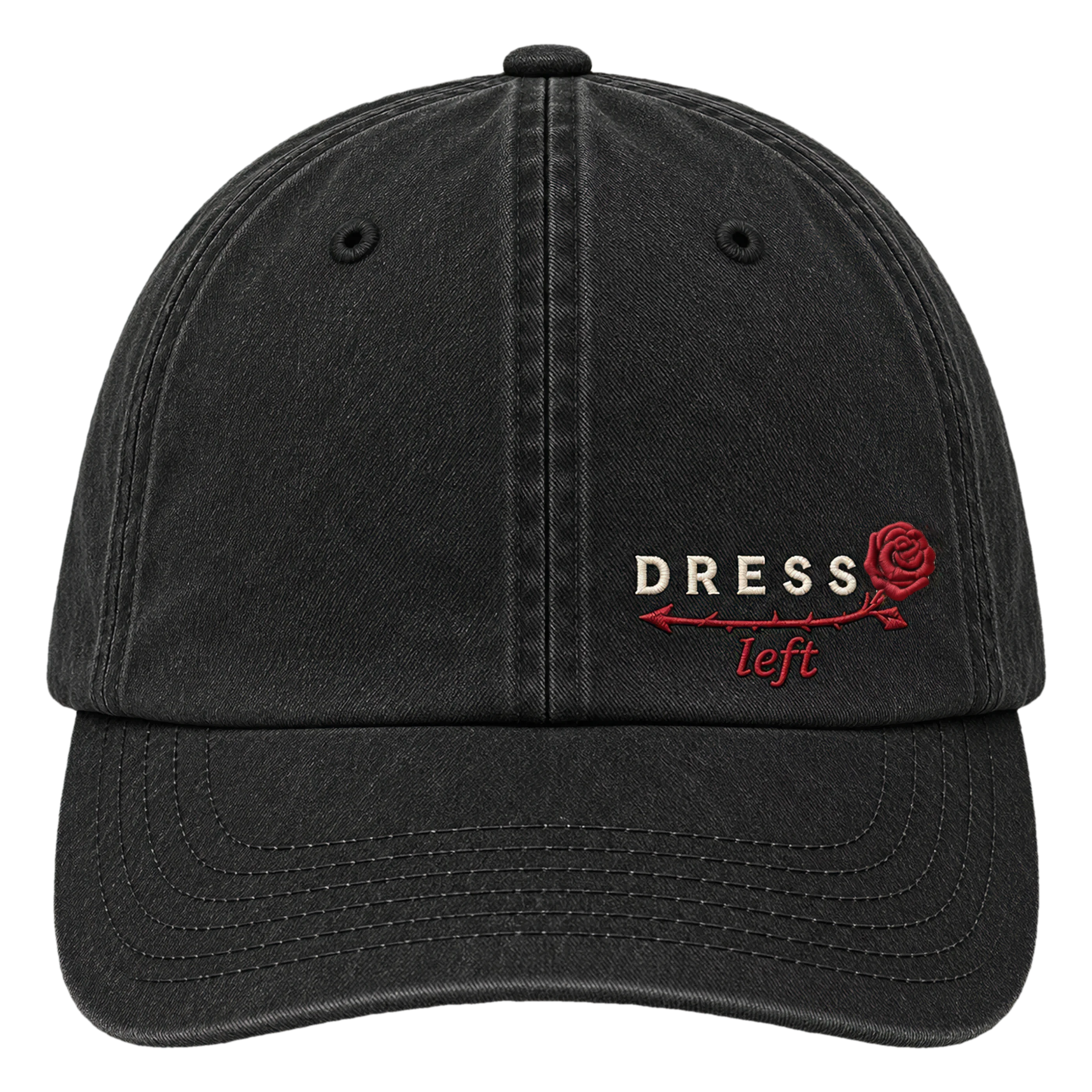 Black washed cotton twill cap with the Dress Left lockup embroidered to the right of the front panel: cream DRESS lettering, a dark-red rose, and the thorned stem running left into an arrow over the word left
